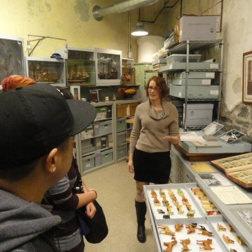 Erica Harman shows visitors toys made by prisoners