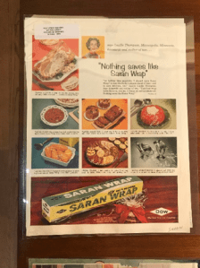 Page with Saran Wrap advertisement on it. Features images of food being wrapped in Saran Wrap.