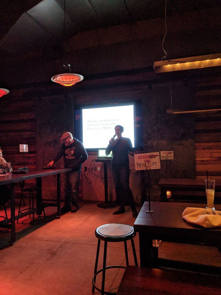 Celia Caust-Ellenbogen speaking to attendees.